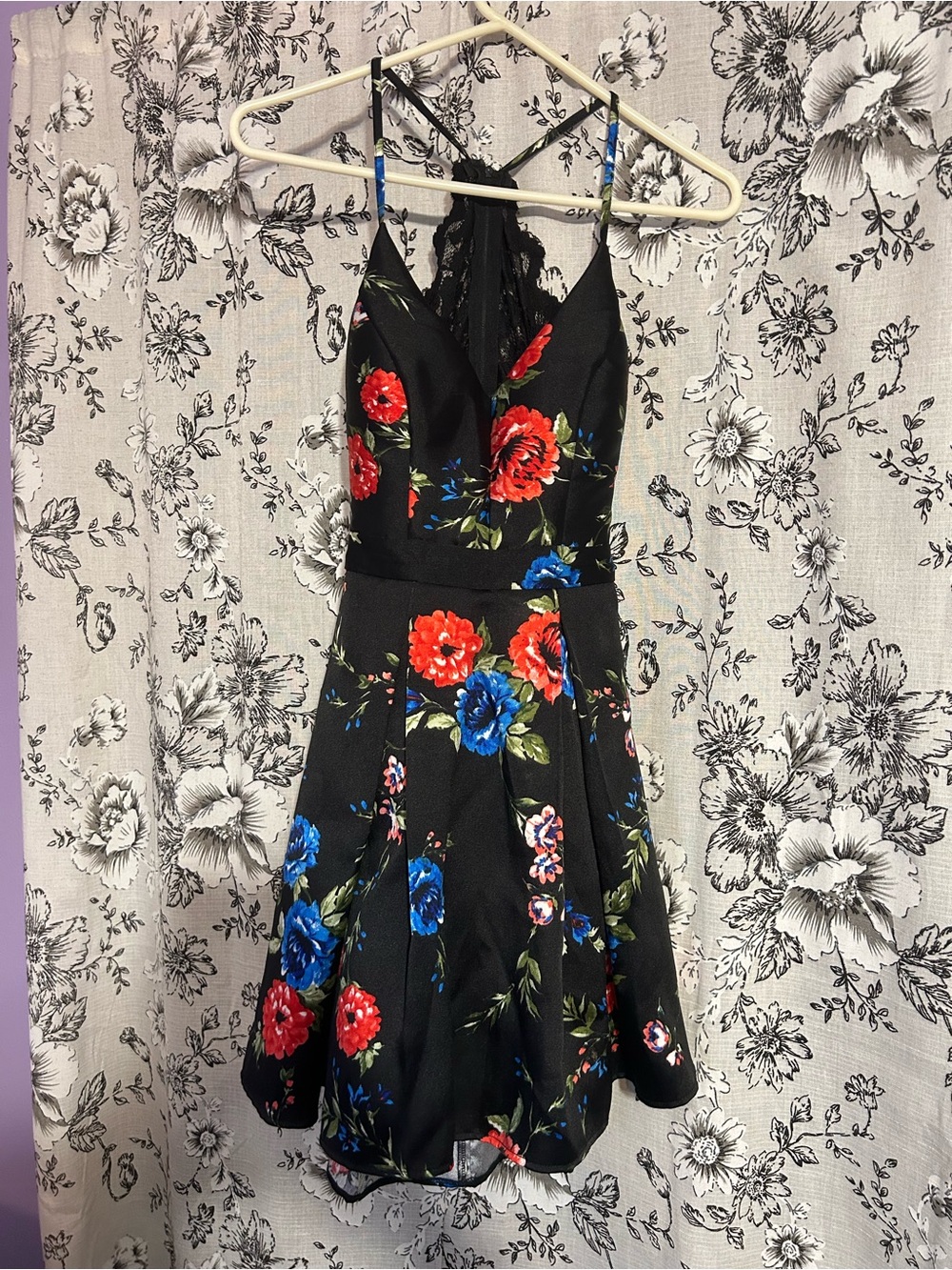 B. Smart Black Mini Dress with Red and Blue Floral Print